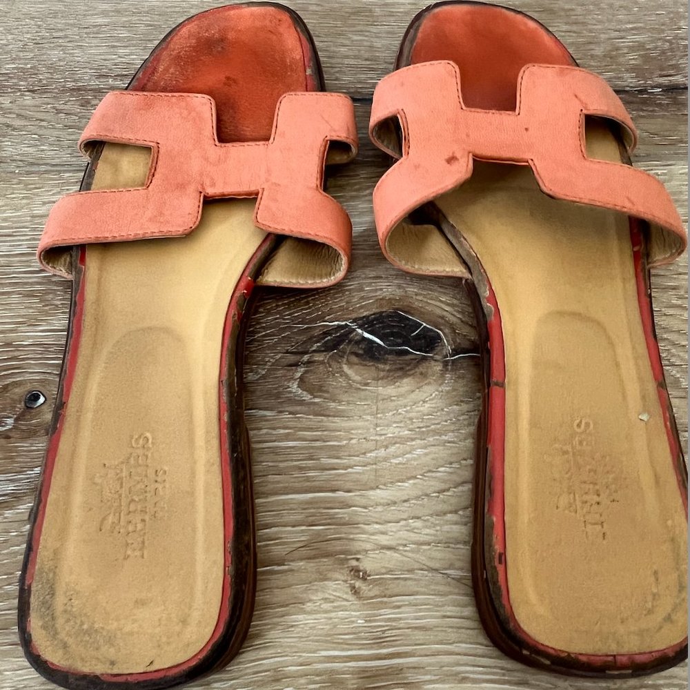 Worn Hermes Oran sandals in coral